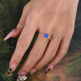 Classic Round Cut Sapphire Engagement Ring with Twisted Band